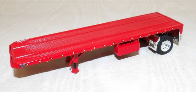 1/64 Red 28.5-Foot Utility Flatbed Trailer – Unboxed